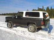 PB150009 - Mike Woodall's Blazer.
Chaining up all 4. He's now the "designated" Trail Boss with all that traction. :)