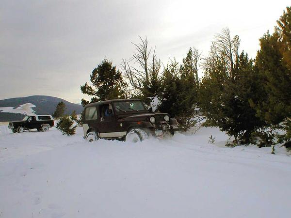 PB150033 - Joan Lewis is doing her best in the passenger seat to "egg" the Jeep on.