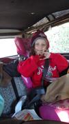 Audrey flashes a gang sign..