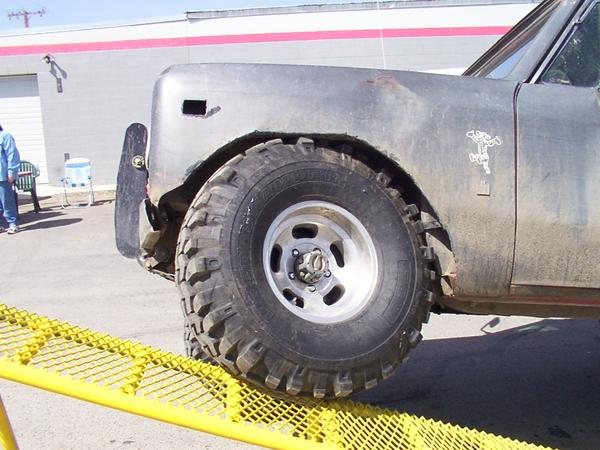 4" lift, 3" cut out of fenders, 36" TSLs.. looks he should've taken out 4"