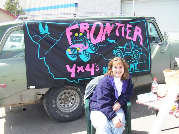 Michelle, manning the registration table- and getting sunburned.