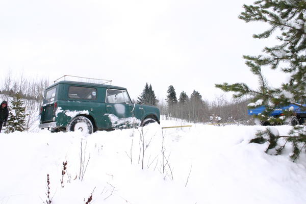 Ben's Unimog draggin the Scout up the hill