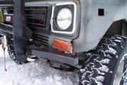 Hit hard enough to ripple the grille and lower valence on the OTHER side.  Naturally, the tree cleared the bumper just fine.