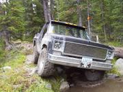 Brondon driving over the rocks.