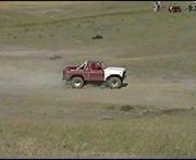 Tom's behind the wheel of a Ford product..