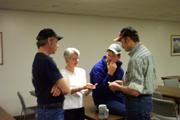Skyliners Rob, Cindy St. Clair, Mountaineer's Mike Nunn and Mike Jongeling