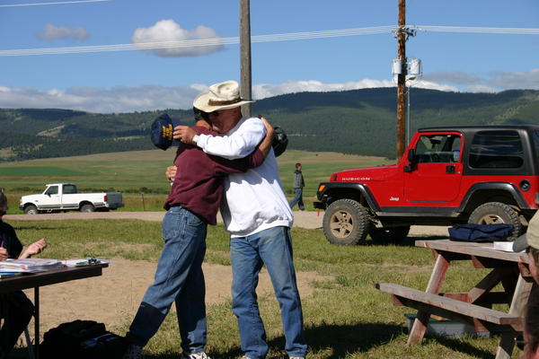 Ron Walker and Bud Wheeler embrace, after Ron was inducted into the Old Farts Racing Team.