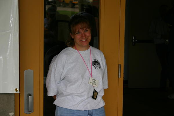 Frontier member and M4x4A Treasurer Michelle Mandera guards the entrance and checking ID (meal tickets)