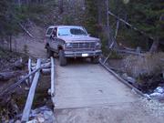 Dougie pilots the Bronco across one of the bridges on the return trip.