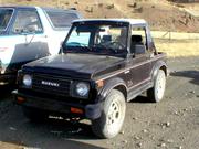 1988 Suzuki Samurai, showroom stock, but with bad front 3rd member, so only 2wd this time around. Slightly wider than stock stre