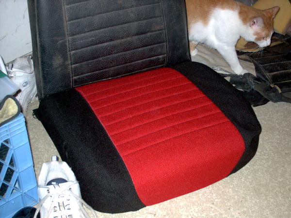 Finished bottom seat cover. I cut the new pieces a little less than a 1/2" larger than the original pieces. I still need to