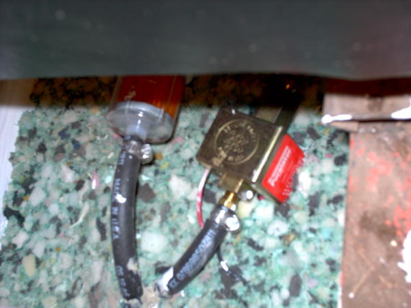 Carpet underpad, under the driver's seat, new fuel filter, and electronic fuel pump. The noise is pretty anoying, I will probabl