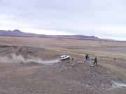 Dennis leaves the coulee and comes back up and drops back into the "bowl" towards the finish line