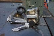 Tom's pile of broken chunks.  So far the 36" TSLs have claimed a few teeth off the rear R&P, one rear axle shaft, and n