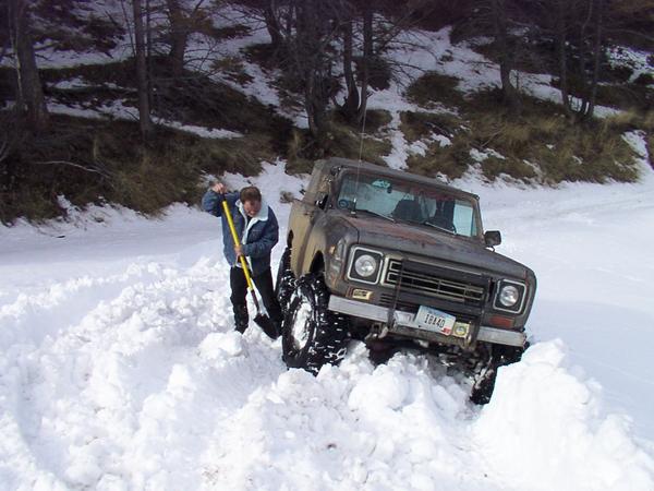 Tom gets in a hurry and tries to take the quick route to the bottom.. Doug Misko helps shovel a path to safety.