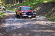 Greg's in the mud.