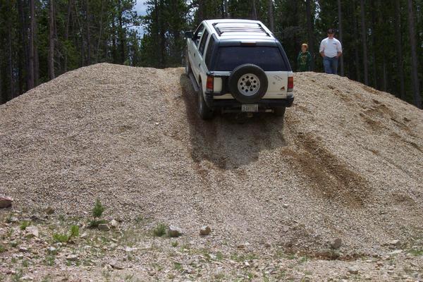 Ray manages to climb up, after plowing with his hitch at the bottom