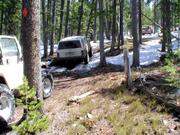 Davin Gordon's Cherokee, Chris's TJ, with Don and Kathy Gordon, and the Kellys a little further up the hill.